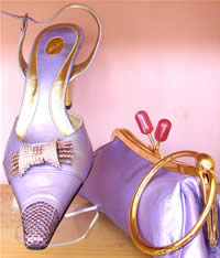 Swarovski Crystal encrusted shoes in pure satin with matching clutch bag